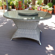 Round lazy-susan with wicker base and glass-top