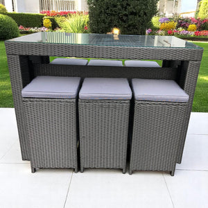 Outdoor furniture set with a high bar table and wicker chairs with gray cushions - DECOR STAR
