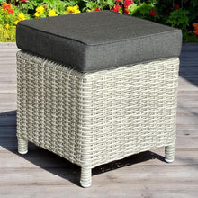 ARMADALE grey wicker ottoman with a dark cushion on a wooden deck - DECOR STAR