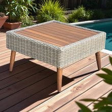 BELLBRAE Wooden outdoor table with wicker sides on a wooden deck - DECOR STAR