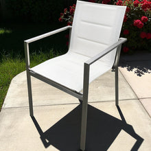 BRUNSWICK white chair with metal frame on a concrete surface - DECOR STAR