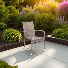 Wicker stacking chair on a patio with garden and plants in the background - DECOR STAR