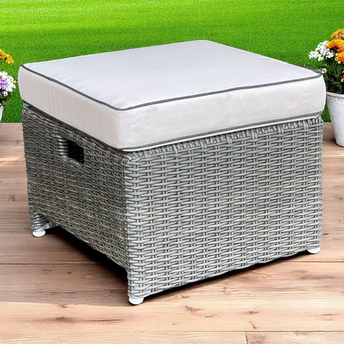 CARLTON dark grey wicker ottoman with a cream cushion on a wooden deck - DECOR STAR