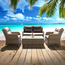 Outdoor MONT ALBERT furniture set on a wooden deck with a beach and turquoise ocean - DECOR STAR