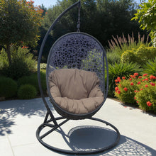FITZROY Hanging egg chair with brown cushion in a garden setting - DECOR STAR