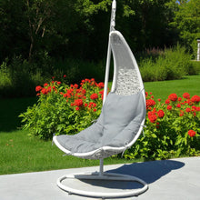 RINGWOOD grey cushion hanging chair with white frame in a garden setting - DECOR STAR