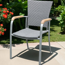 FAIRFIELD grey wicker chair with wooden armrests on a patio - DECOR STAR