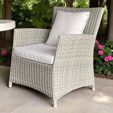GLEN IRIS grey PE wicker chair with beige cushions on a patio - DECOR STAR
