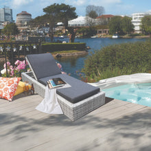 NORTHCOTE wicker gas-spring sunlounge with grey cushions by a poolside - DECOR STAR