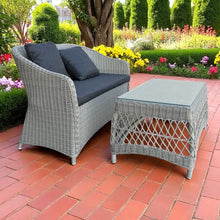 PRESTON wicker 2-seater lounge with a coffee table on a patio - DECOR STAR