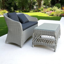 PRESTON outdoor grey wicker 2-seater with dark cushions on a patio - DECOR STAR