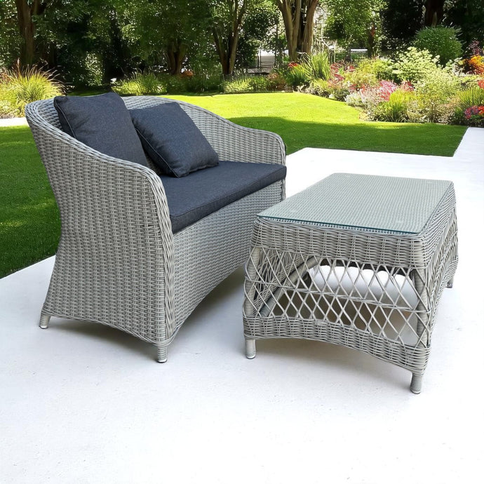 PRESTON outdoor grey wicker 2-seater with dark cushions on a patio - DECOR STAR