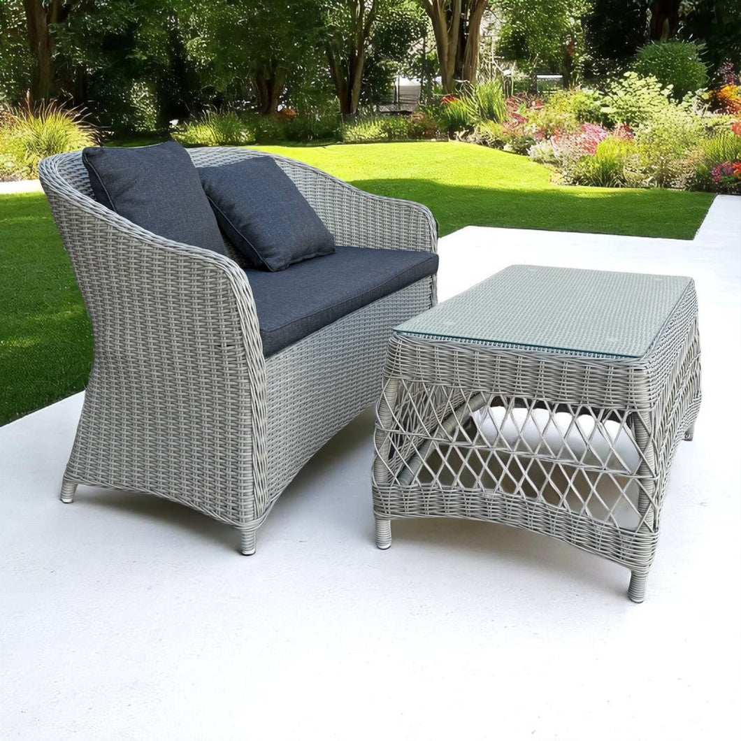 PRESTON outdoor grey wicker 2-seater with dark cushions on a patio - DECOR STAR