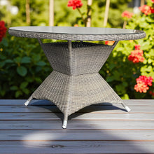 PE wicker round table 120 cm on a wooden deck - DECOR STAR