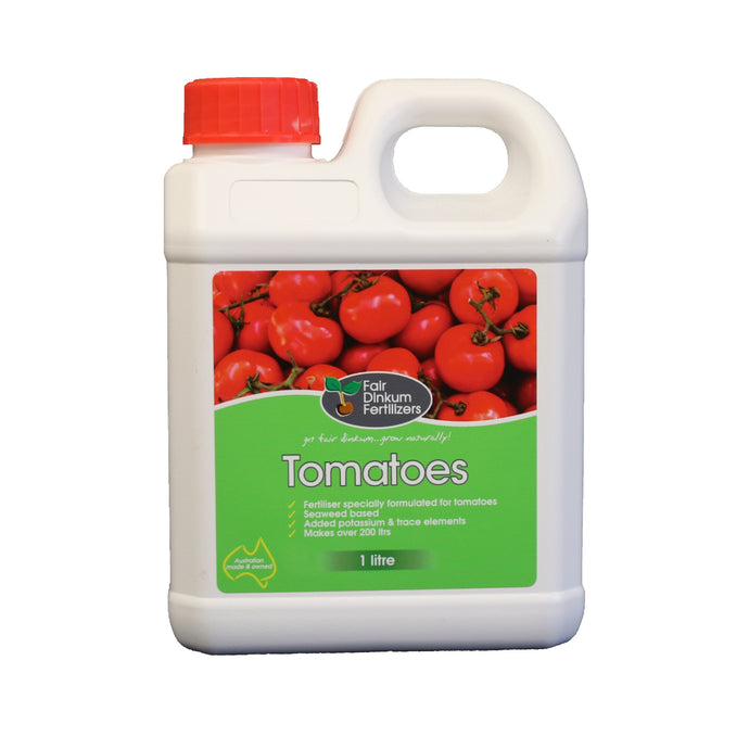 Fertilizer bottle for tomatoes with a red cap and green label